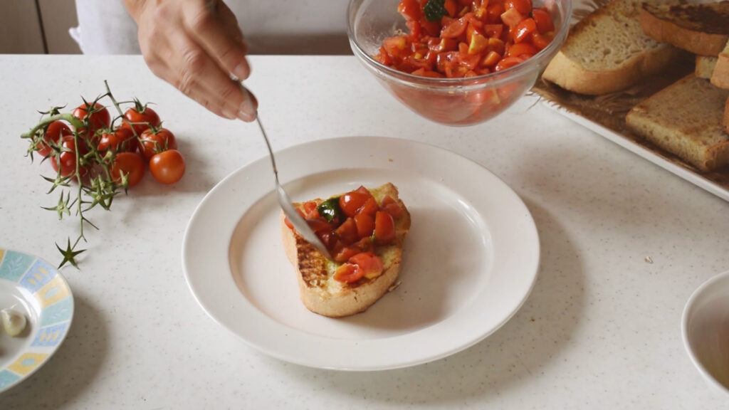 Top with tomato-basil mixture.