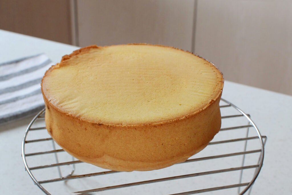 Unmold the cake before it cools and flip it onto a rack.